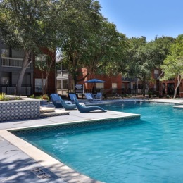 pool with lounge chairs