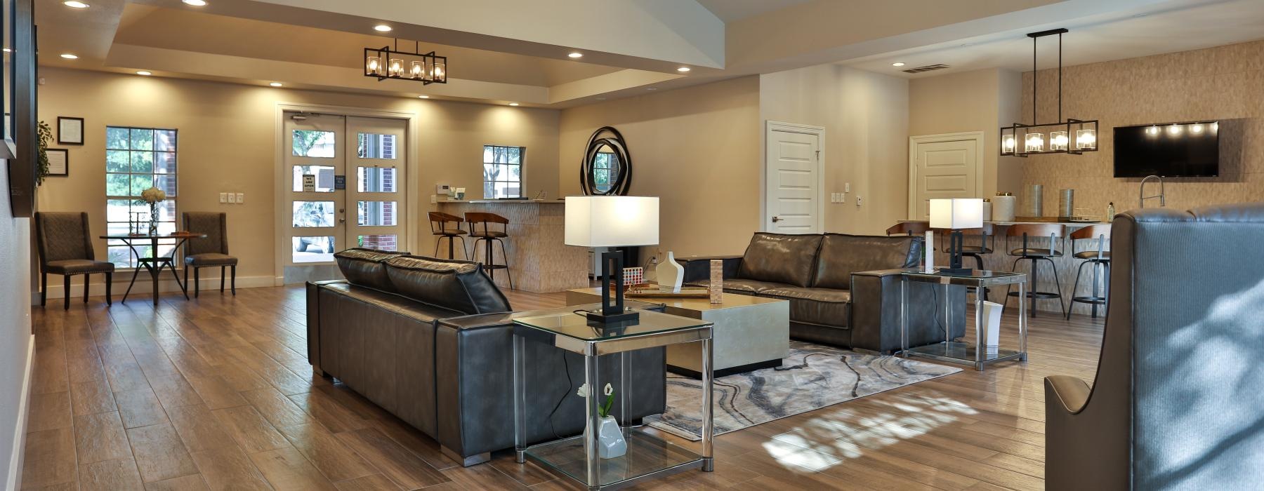 a large living room with a wood floor